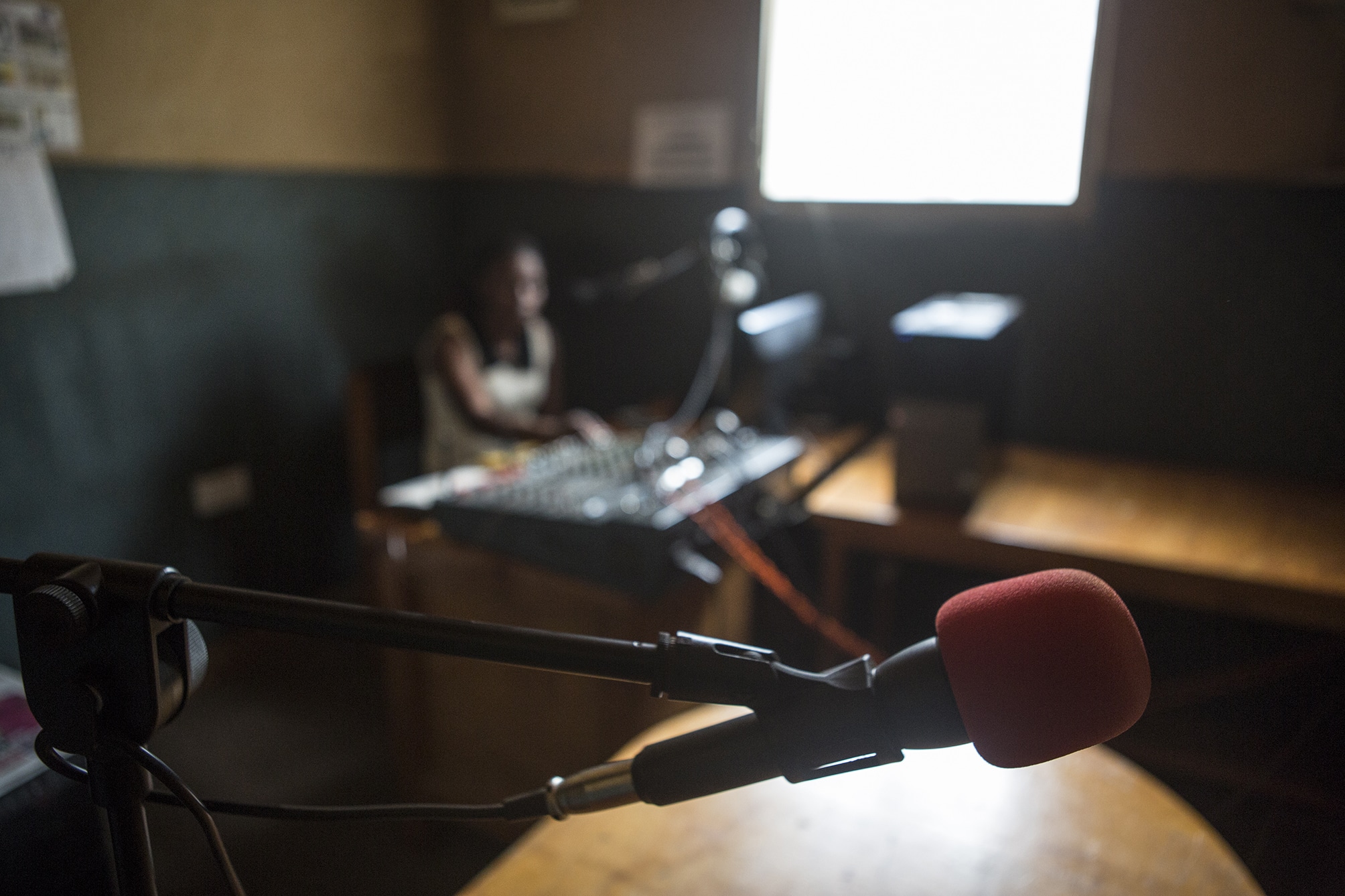 Red microphone in the foreground